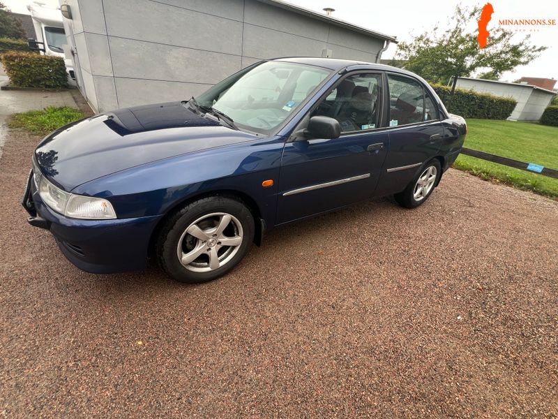 mitsubishi-mitsubishi-lancer-sedan-13-12v-fwd
