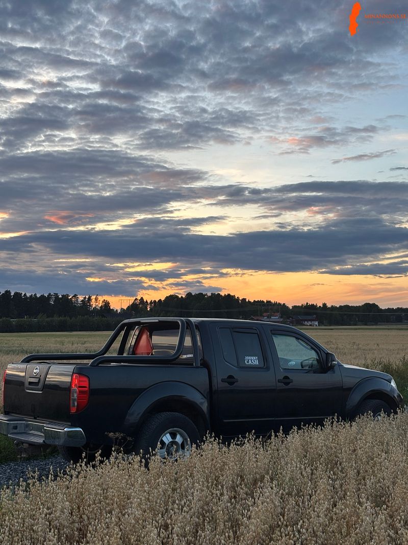 nissan-navara-d40-2011-a-traktor