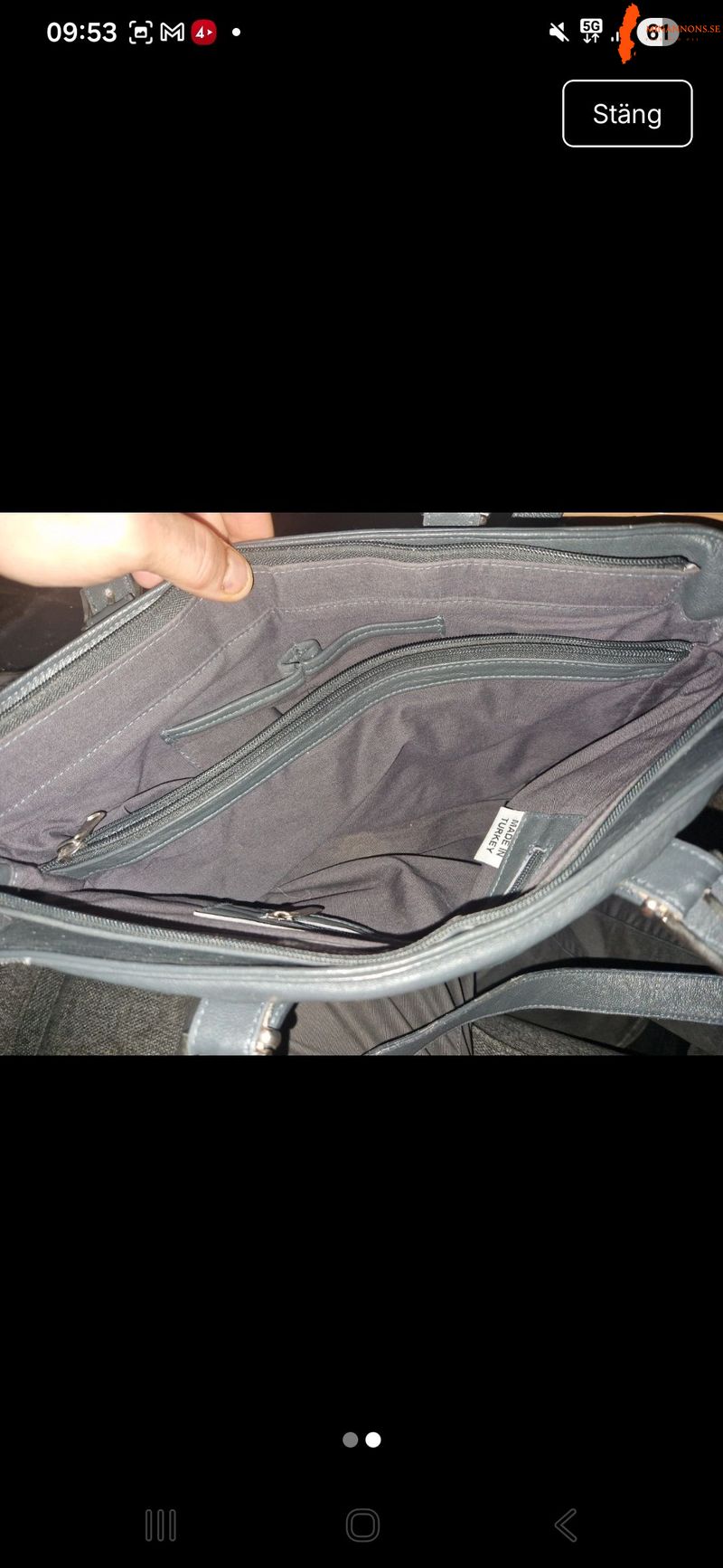 svart-handvaska-med-silvriga-detaljer