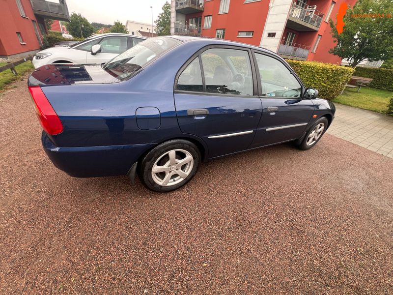 mitsubishi-mitsubishi-lancer-sedan-13-12v-fwd