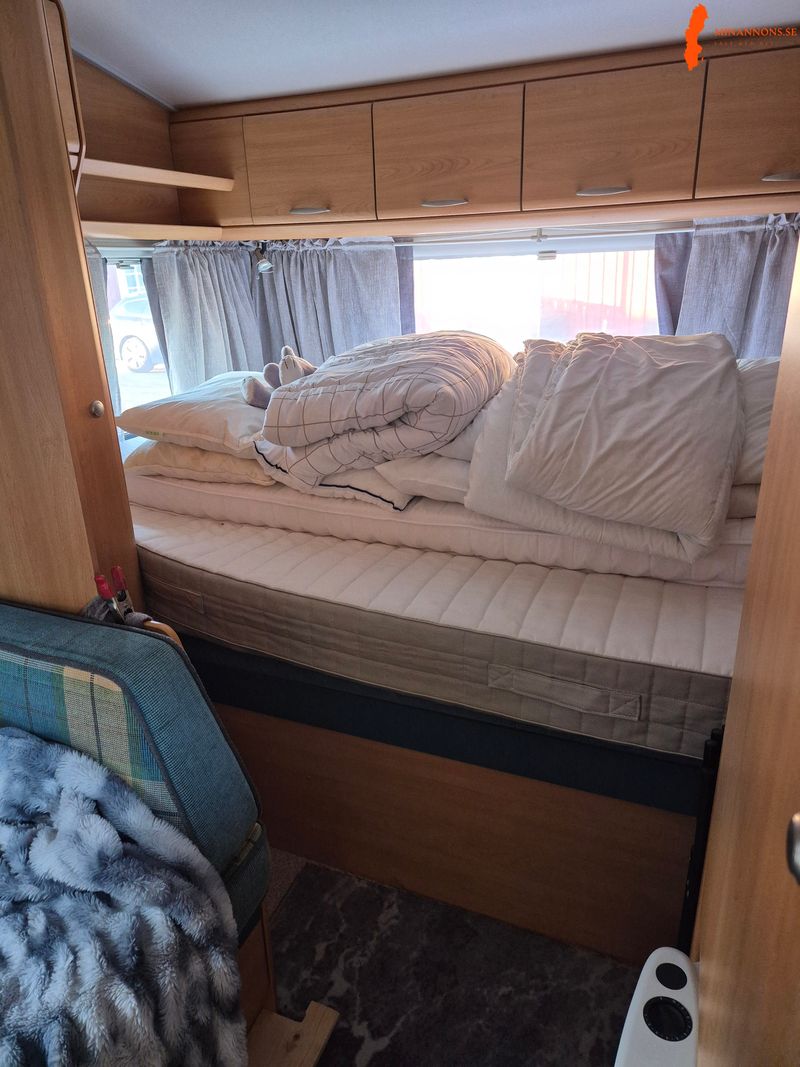 knaus-sudwind-550-barnkammare-dubbelsang-vaningssang
