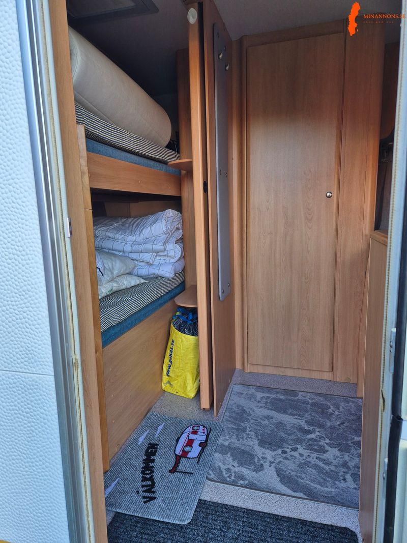 knaus-sudwind-550-barnkammare-dubbelsang-vaningssang