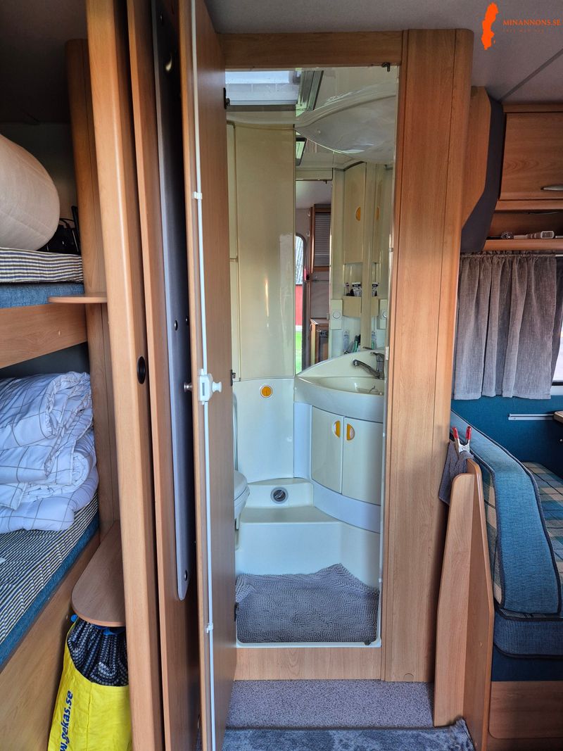 knaus-sudwind-550-barnkammare-dubbelsang-vaningssang