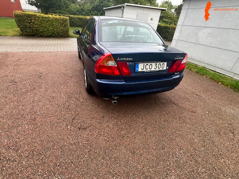 mitsubishi-mitsubishi-lancer-sedan-13-12v-fwd