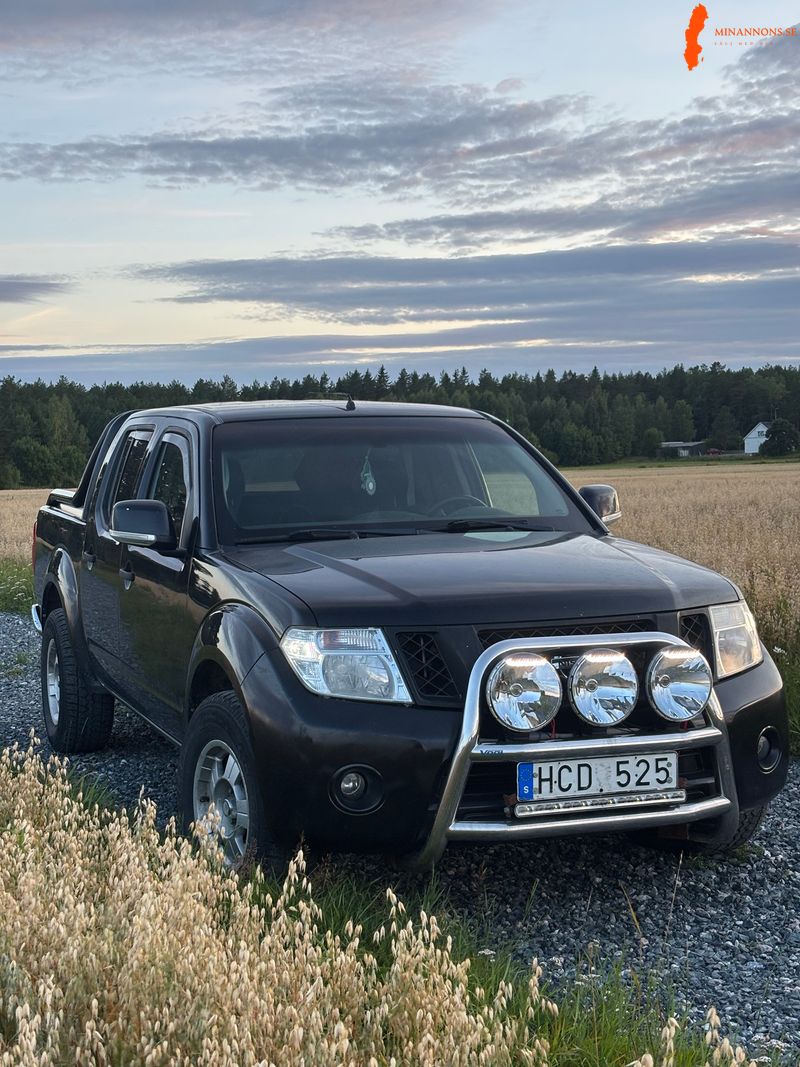nissan-navara-d40-2011-a-traktor