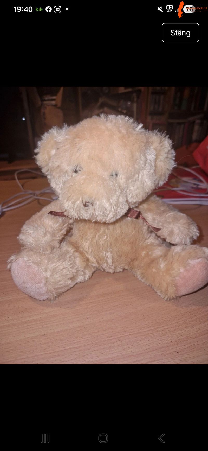 beige-mjuk-nallebjorn-med-rosett